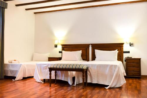 Habitación Triple del hotel The Place Bodega Real by ALEGRIA. Foto 1