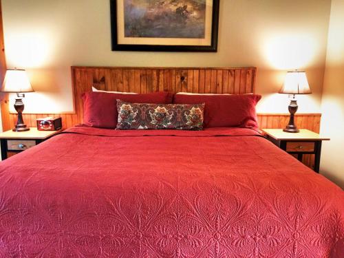 Habitación Deluxe con cama extragrande del hotel The Hungry Trout. Foto 2