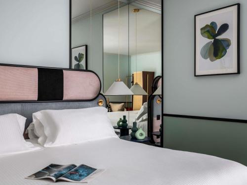 Chambre Double Deluxe avec Canapé del hotel Faubourg Galant Paris - Handwritten Collection. Foto 9