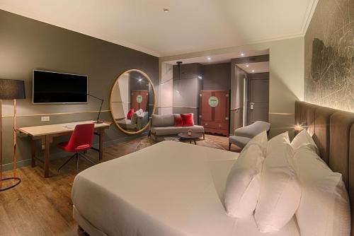 Habitación familiar del hotel Nh Collection Milano Porta Nuova. Foto 2