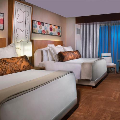 Habitación Deluxe con 2 camas grandes del hotel Del Lago Resort & Casino. Foto 3