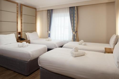 Habitación cuádruple del hotel Royal Eagle. Foto 4