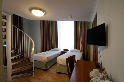 Habitación Familiar del hotel Royal Eagle. Foto 3