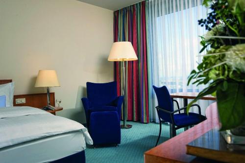 Habitación Familiar Comfort doble con 2 camas del hotel Maritim Frankfurt. Foto 4