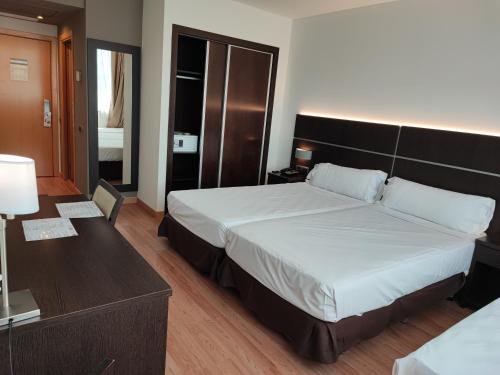 Habitación Triple del hotel Tarraco Park. Foto 1