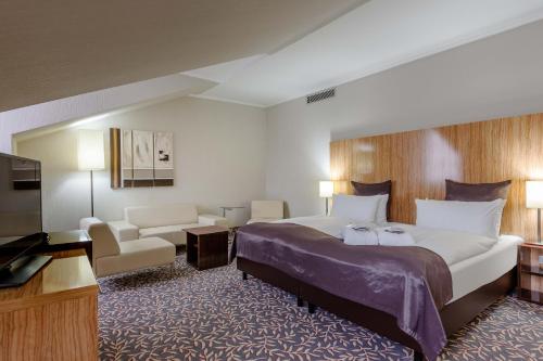 Habitación Privilege con cama extragrande del hotel Mercure Wiesbaden City