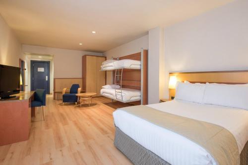 Habitación Familiar del hotel Castellon Center Affiliated By Meliá. Foto 1