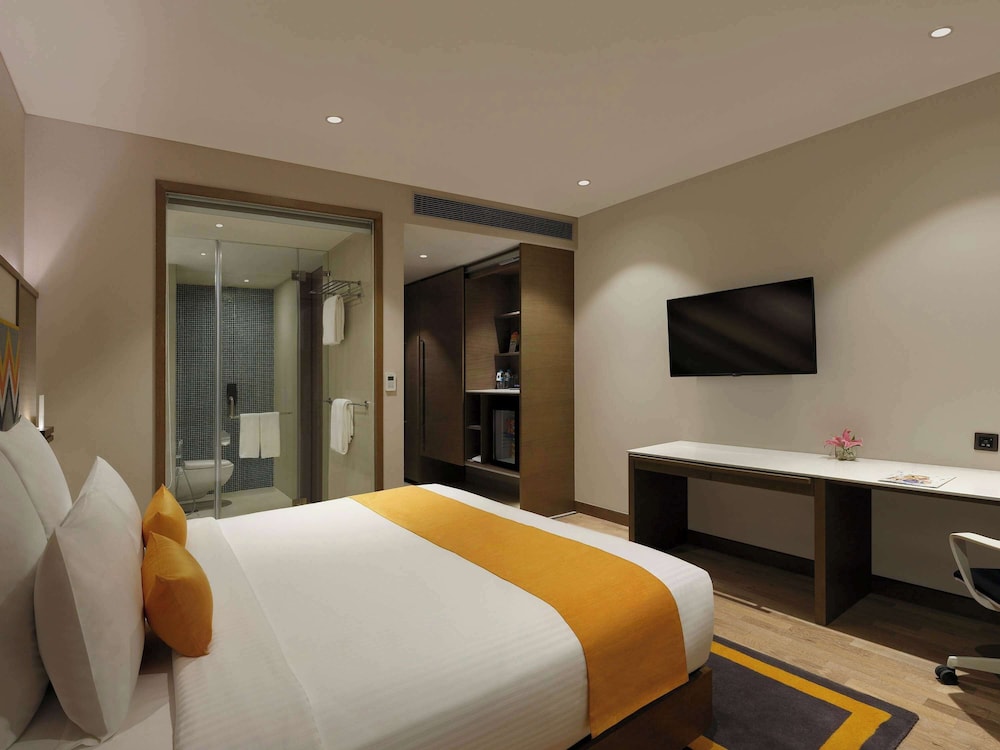 Habitación Ejecutiva King con horas de cóctel gratuitas de 18:00 a 20:00 h del hotel Novotel Guwahati Gs Road. Foto 4