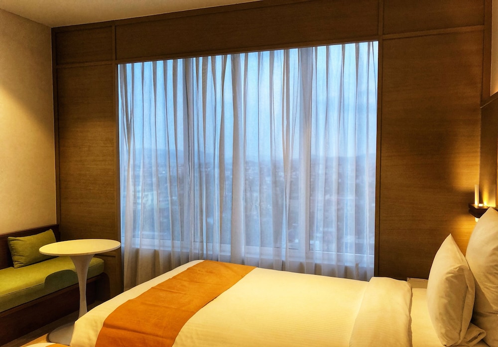 Habitación Ejecutiva con 2 Camas Individuales y horas de cóctel gratuitas de 18:00 a 20:00 h del hotel Novotel Guwahati Gs Road. Foto 3