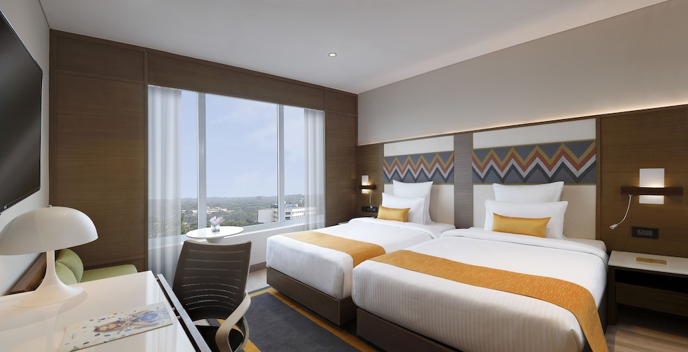 Habitación Ejecutiva con 2 Camas Individuales y horas de cóctel gratuitas de 18:00 a 20:00 h del hotel Novotel Guwahati Gs Road. Foto 7