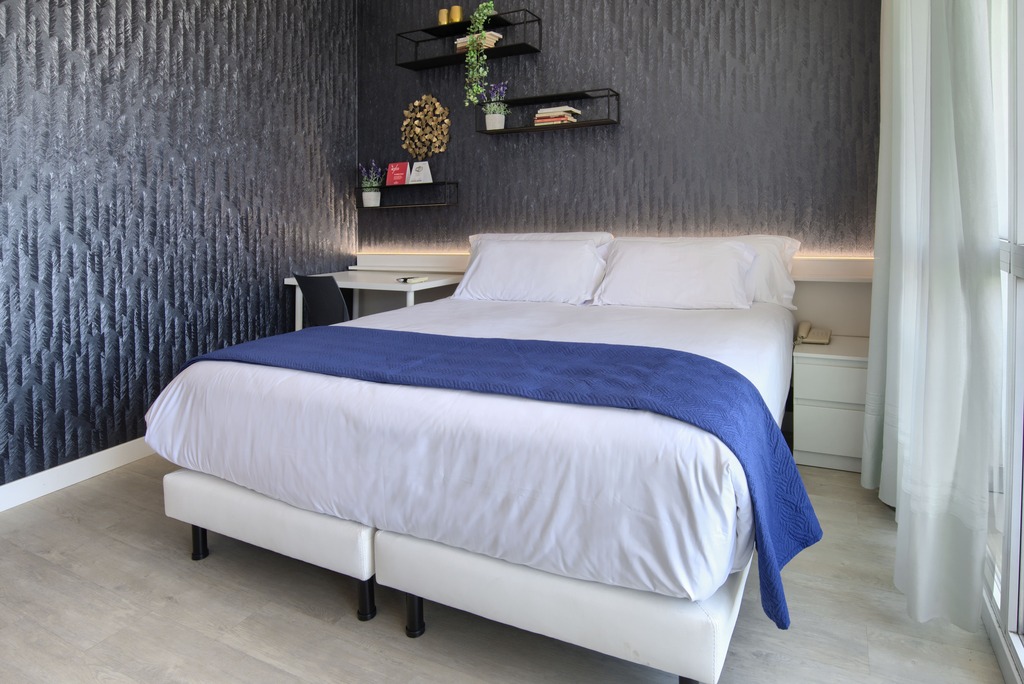 Habitación triple del hotel Luze El Villa. Foto 3