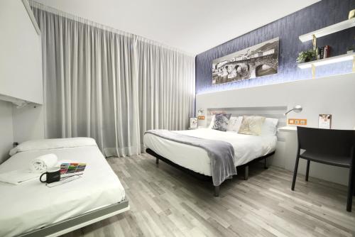 Habitación Doble Superior con vistas al jardín - 1 o 2 camas del hotel Luze El Villa. Foto 3