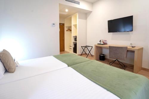 Habitación Individual Confort del hotel Dwo Valencia. Foto 3