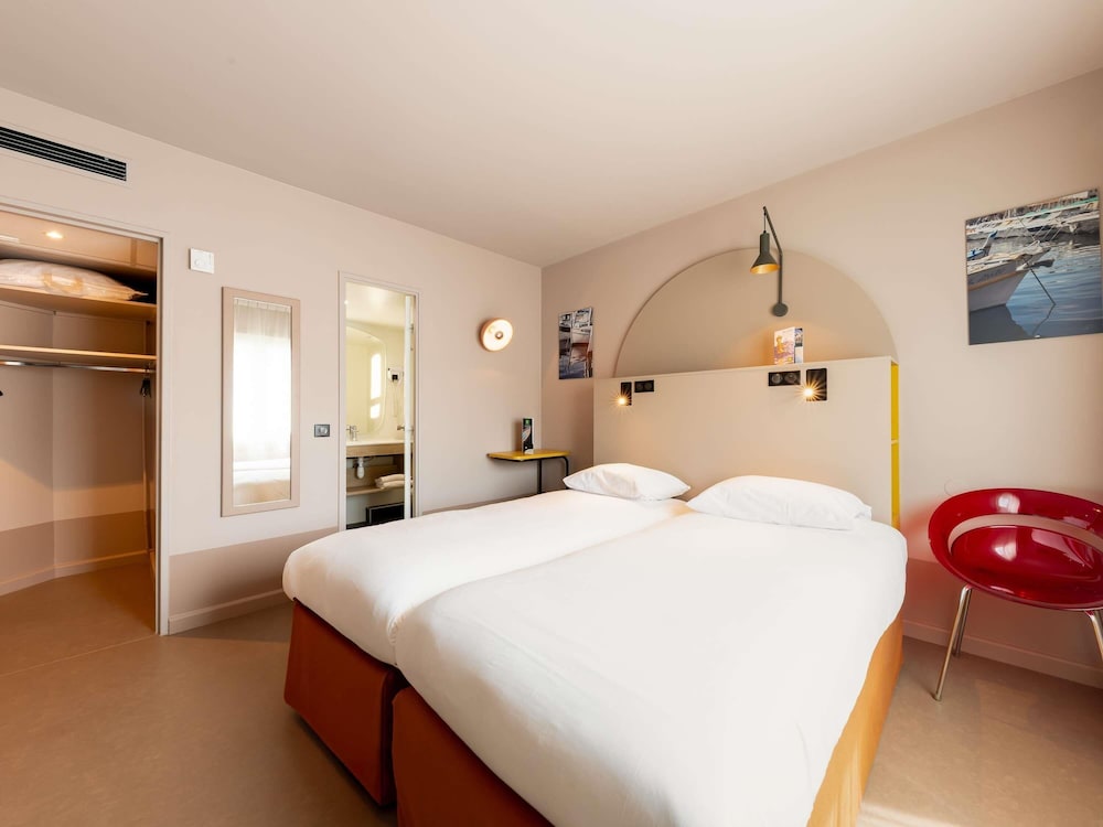 Habitación estándar con dos camas individuales del hotel Ibis Styles Marseille Centre Prado Castellane. Foto 5