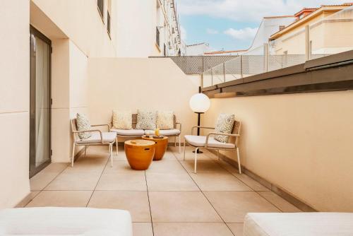 Habitación Deluxe con terraza del hotel Vincci Soho. Foto 1