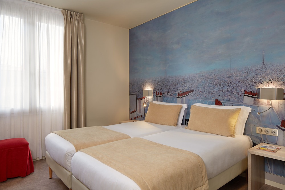 Habitación con 2 camas individuales del hotel Fertel Maillot