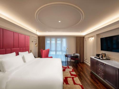 HABITACIÓN DELUXE, 1 Cama King Size del hotel Hotel de l'Opera Hanoi - MGallery. Foto 1