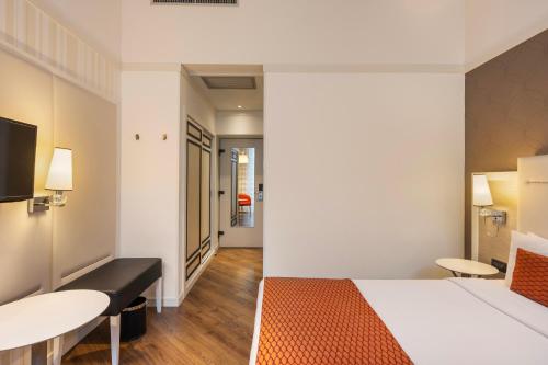 Habitación Doble Deluxe - 1 o 2 camas del hotel Ikonik Parlament. Foto 6