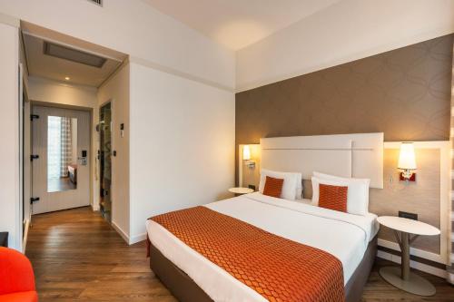 Habitación Doble Deluxe - 1 o 2 camas del hotel Ikonik Parlament. Foto 11