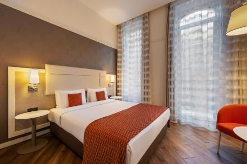 Habitación Doble Deluxe - 1 o 2 camas del hotel Ikonik Parlament. Foto 14