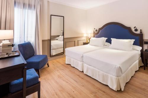 Habitación Doble - 1 o 2 camas del hotel H10 Corregidor Boutique. Foto 2