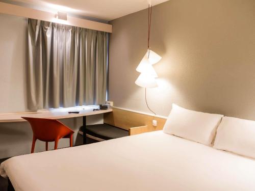 Habitación Doble Estándar del hotel Ibis Evora. Foto 7
