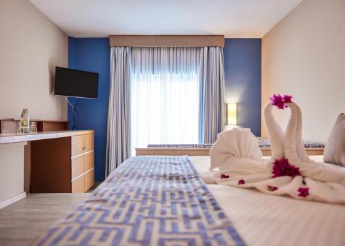 Habitación individual Vista Jardin Superior Sofá Cama incluido 1 Cama Individual del hotel Robinson Esquinzo Playa - All Inclusive. Foto 2