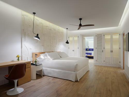 Suite Vista Mar Planta Alta Sofá Cama incluido 2 Camas individuales del hotel H10 Atlantic Sunset Horizons Collection. Foto 4