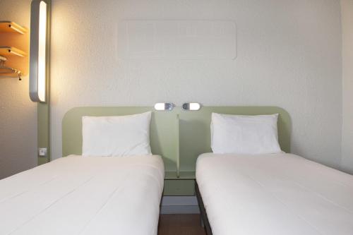 Habitación Doble Estándar - 2 camas del hotel Ibis Budget Goussainville Cdg. Foto 4