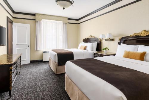 Suite Doble Deluxe - Cama grande del hotel Lucerne