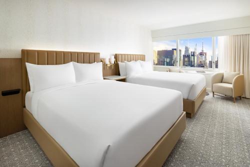 Habitación con vistas a Times Square - 2 camas dobles grandes del hotel Hyatt Regency Times Square. Foto 1