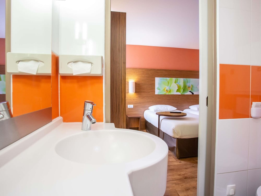 Habitación estándar con 2 camas individuales del hotel Ibis Styles Bourges. Foto 8