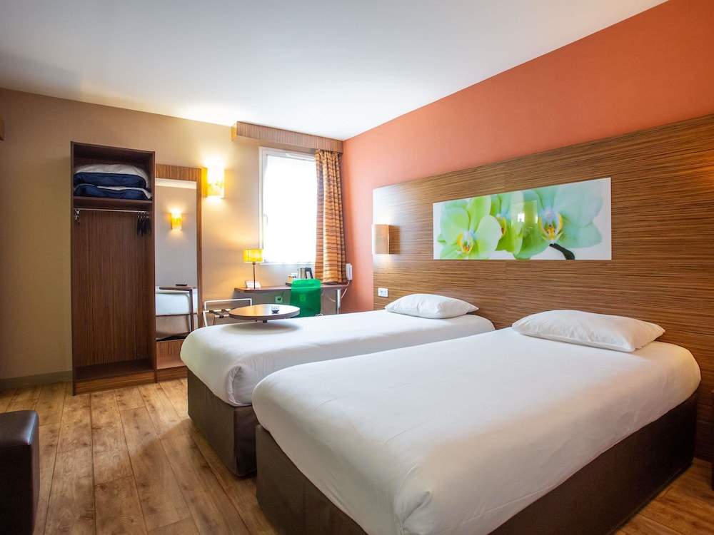 Habitación estándar con 2 camas individuales del hotel Ibis Styles Bourges. Foto 9