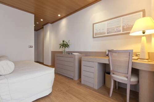 Habitación triple del hotel Las Arenas Balneario Resort