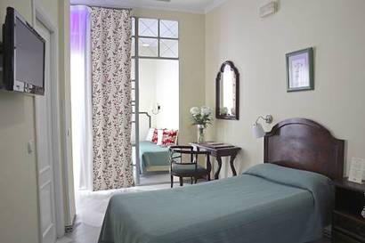 Habitación familiar del hotel BYPILLOW Abril