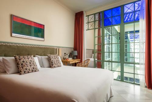 Habitación Triple Estándar del hotel BYPILLOW Abril