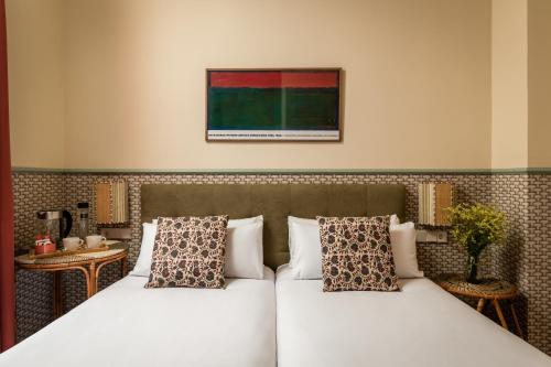 Habitación Triple Estándar del hotel BYPILLOW Abril. Foto 3