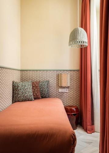 Habitación Triple Estándar del hotel BYPILLOW Abril. Foto 7