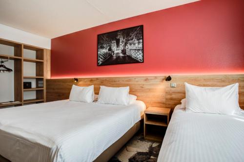 Habitación Triple del hotel Des Congrès. Foto 2