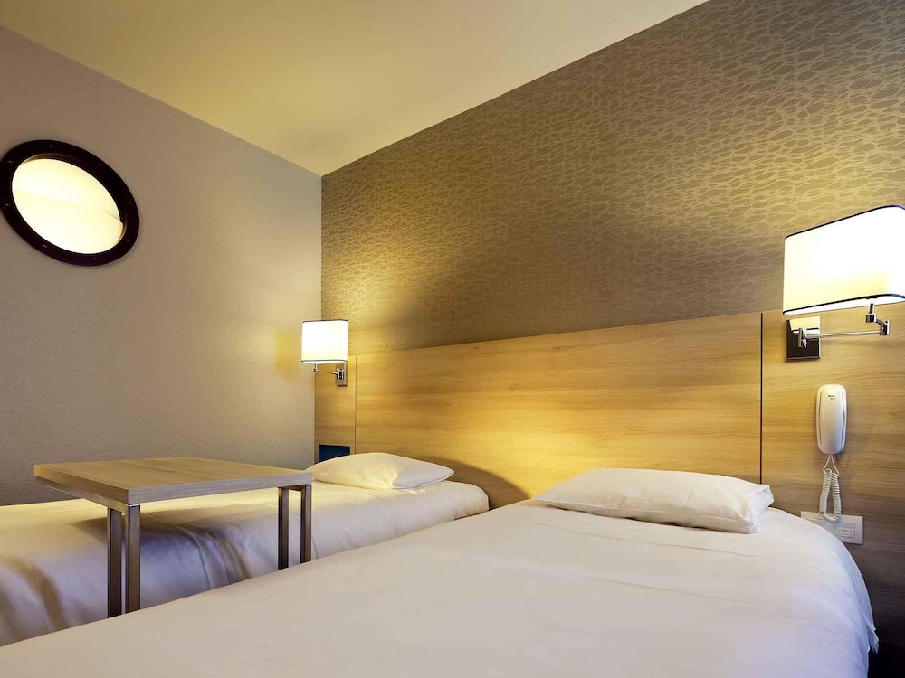 Habitación estándar con dos camas individuales del hotel Ibis Styles Ouistreham