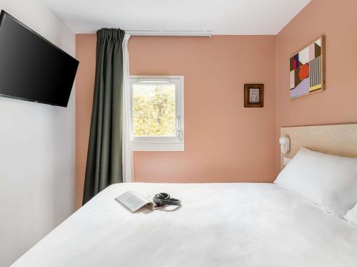 Habitación Pop con 1 cama doble del hotel greet Prévessin Genève Aéroport. Foto 2