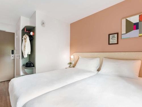 Habitación Pop con 2 camas individuales del hotel greet Prévessin Genève Aéroport. Foto 4