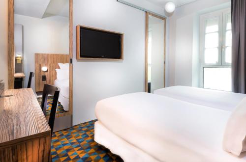 Habitación Doble Confort del hotel Libertel Gare Du Nord Suede