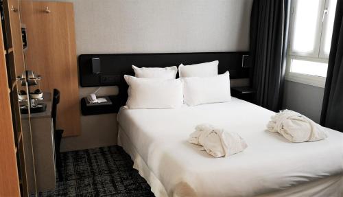 Habitación Doble Club del hotel Libertel Gare Du Nord Suede. Foto 1