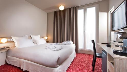 Habitación Doble Privilege París del hotel Libertel Gare Du Nord Suede. Foto 1
