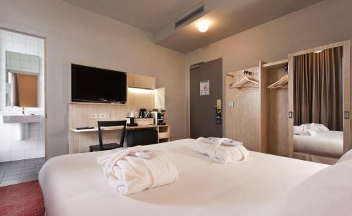 Habitación Doble Privilege París del hotel Libertel Gare Du Nord Suede. Foto 2