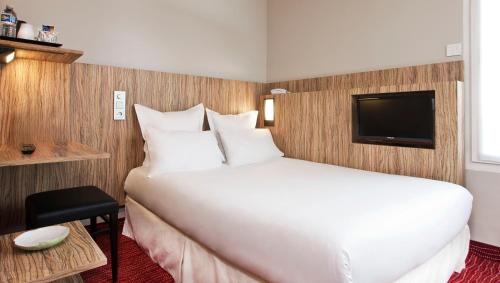 Habitación Doble Acogedora del hotel Libertel Gare Du Nord Suede. Foto 1