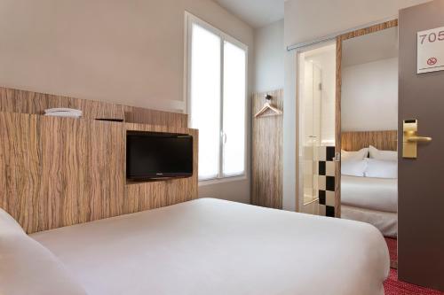 Habitación Doble Acogedora del hotel Libertel Gare Du Nord Suede. Foto 2