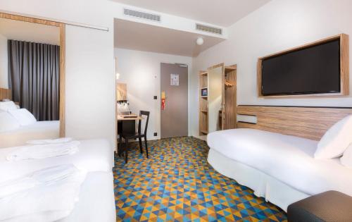 Habitación Familiar del hotel Libertel Gare Du Nord Suede. Foto 4