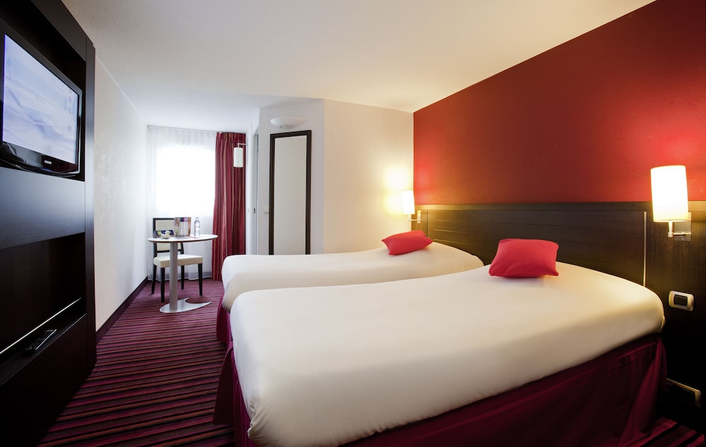 Habitación estándar con camas individuales del hotel Ibis Styles Belfort Centre. Foto 1